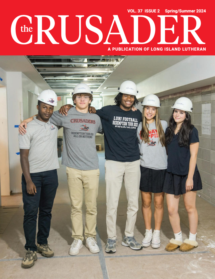 magazine cover with students standing in construction zone